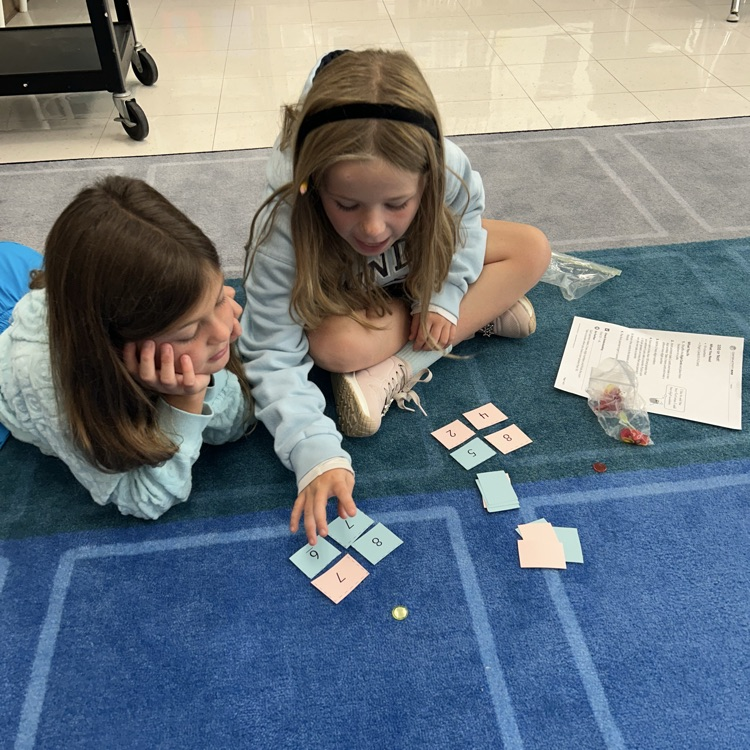 3LC practices adding by place value in rotating math stations