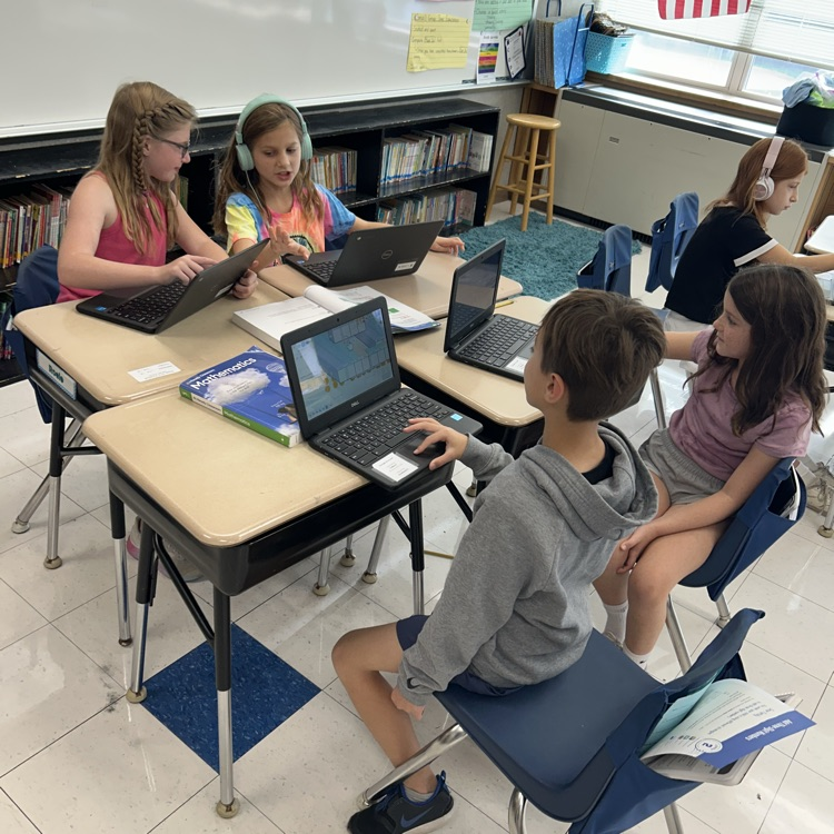 3LC practices adding by place value in rotating math stations