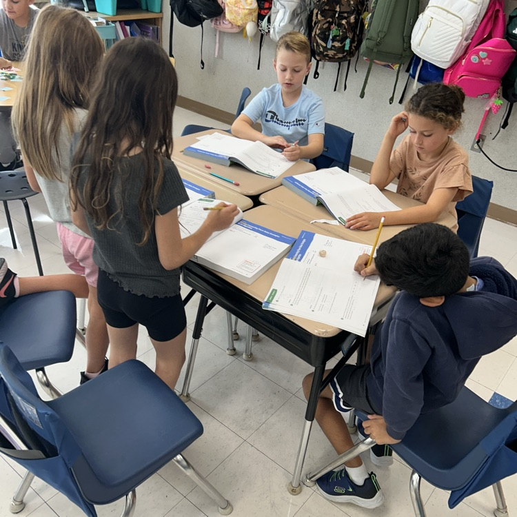 3LC practices adding by place value in rotating math stations