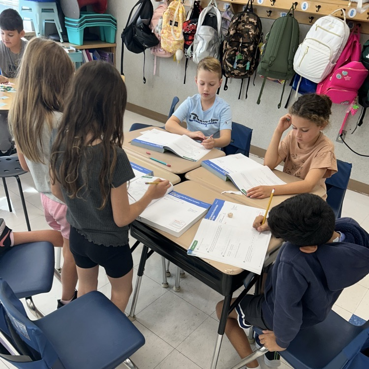 3LC practices adding by place value in rotating math stations