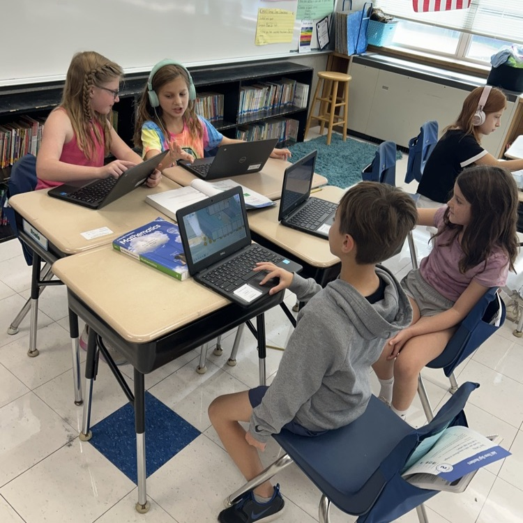 3LC practices adding by place value in rotating math stations