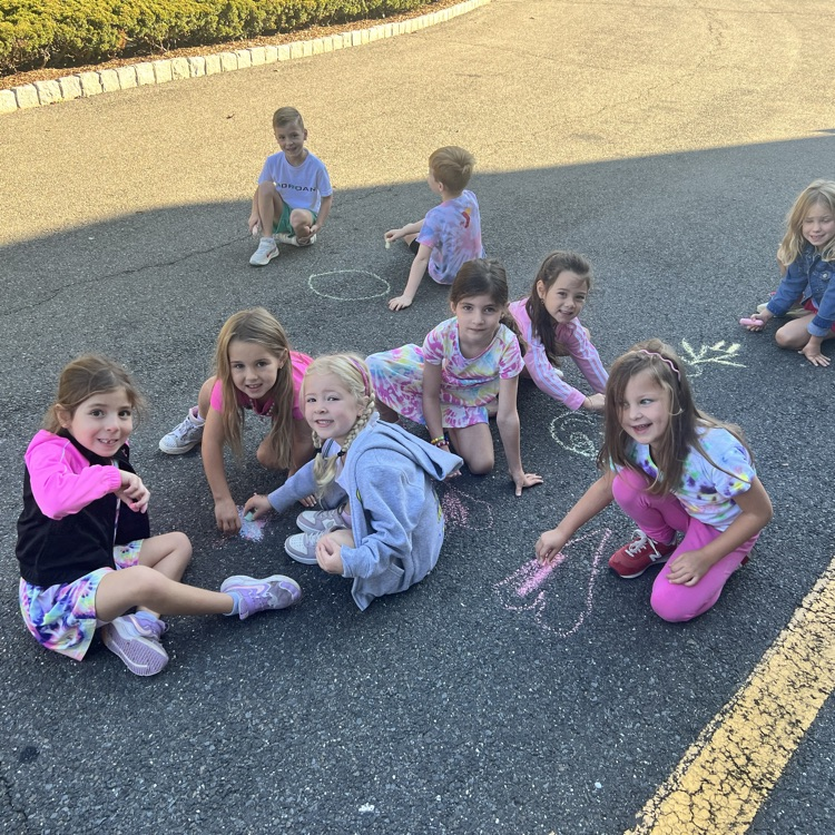 KRO participated in the Kindness Chalk activity and drew pictures of love, peace & kindness