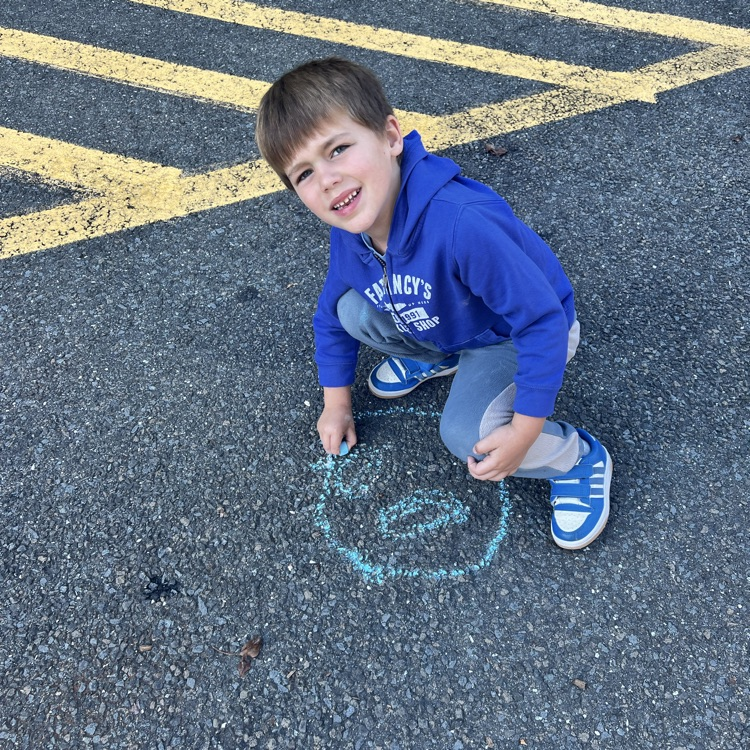 KRO participated in the Kindness Chalk activity and drew pictures of love, peace & kindness