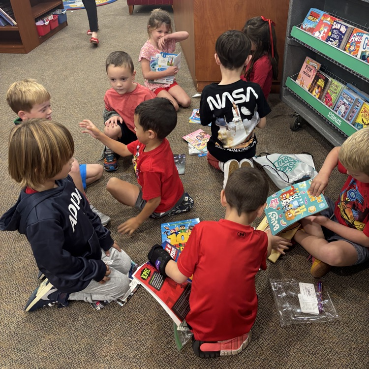 children reading their books