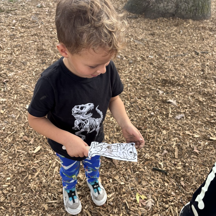 boy holding a puppet