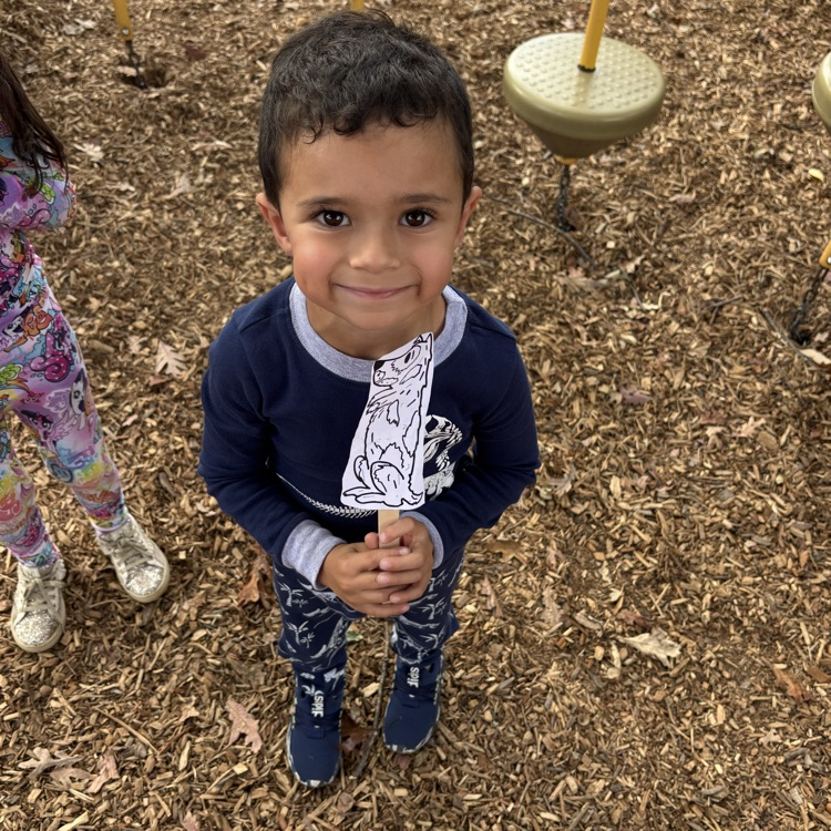 boy holding a puppet