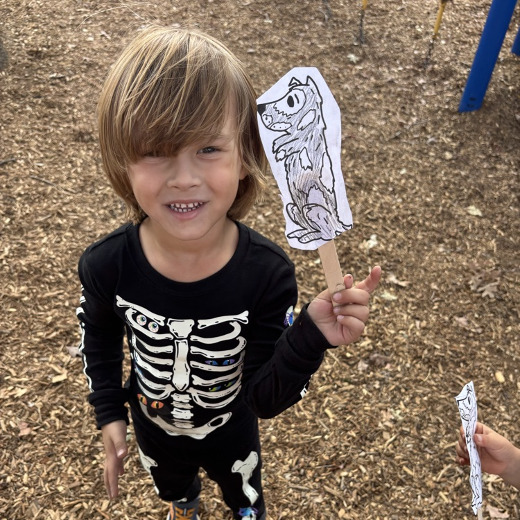 boy holding a puppet