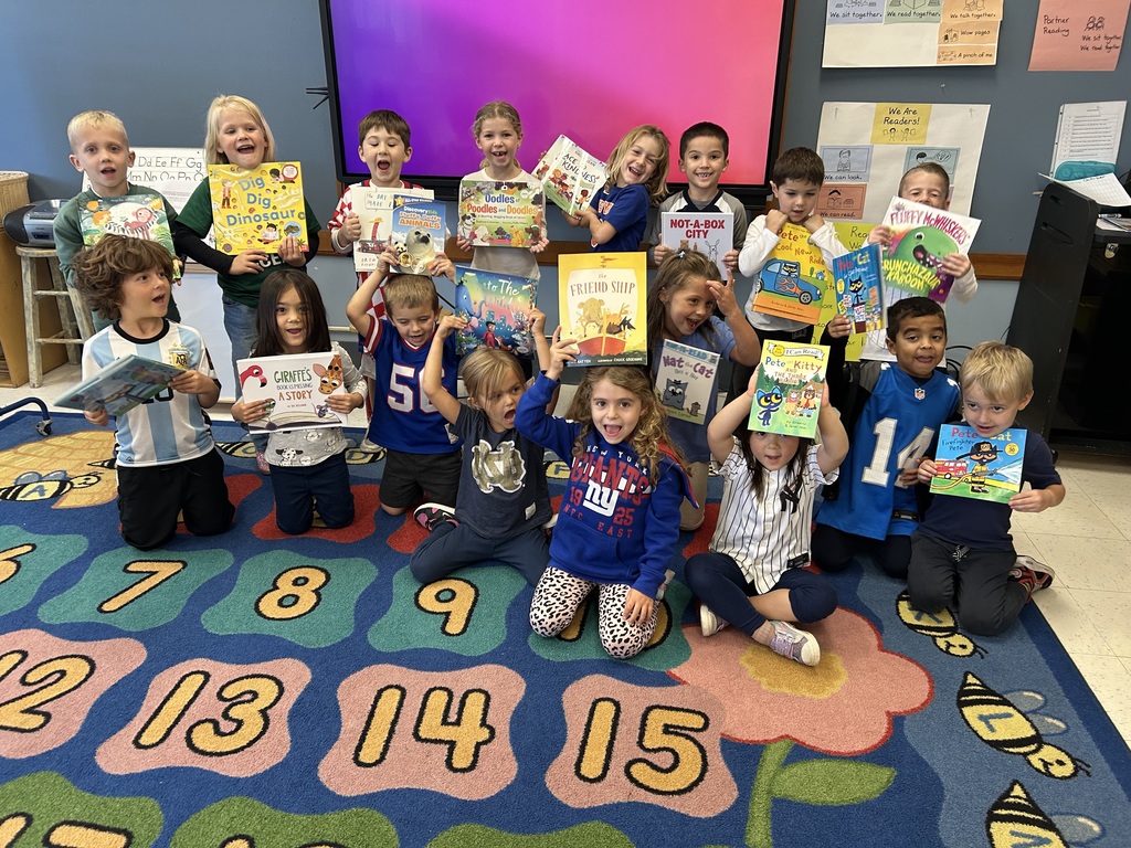 children holding books