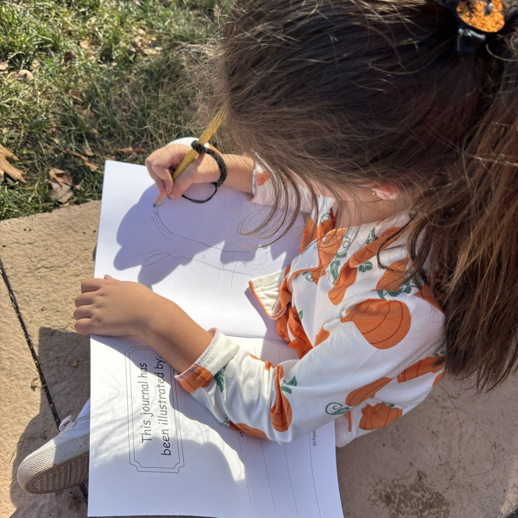 girls sketching a tree