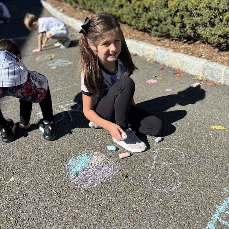 girl drawing hearts
