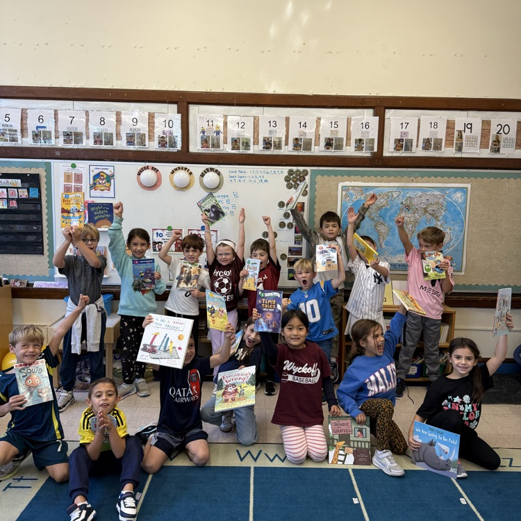 silly faces while holding books