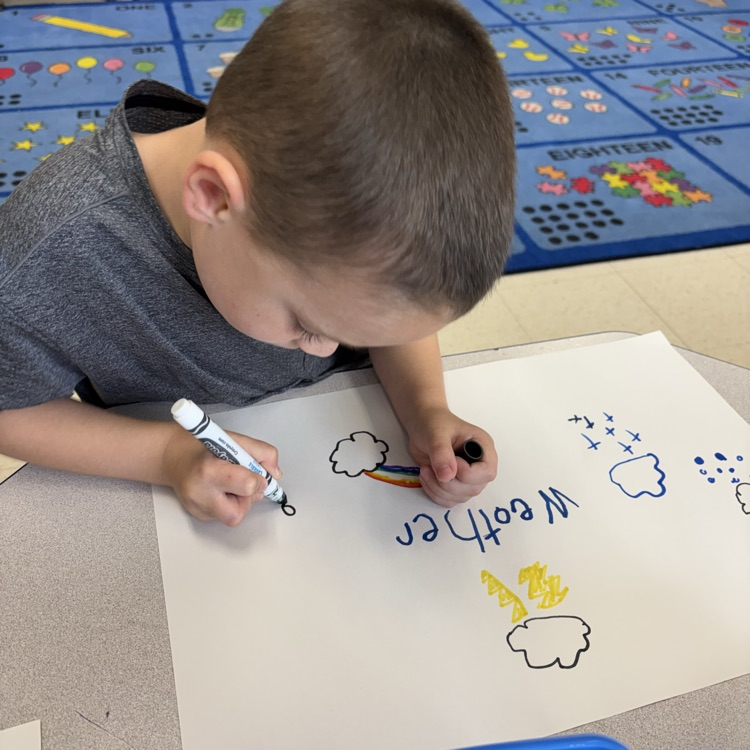 student drawing pictures