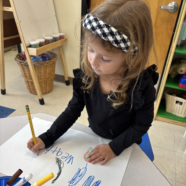 student drawing pictures