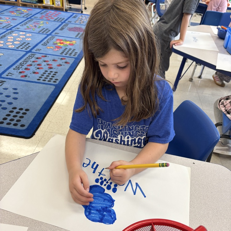 student drawing pictures