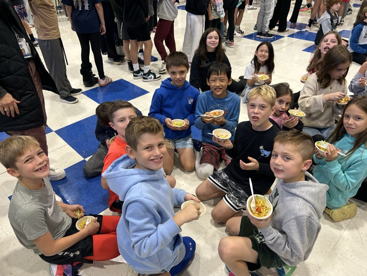 third graders enjoying taco bar