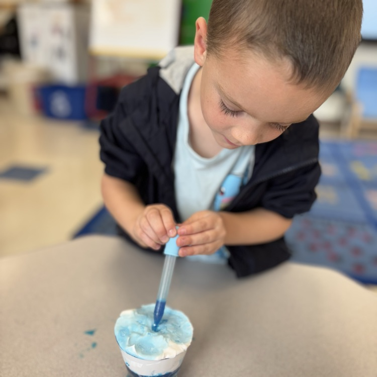 student using a dropper