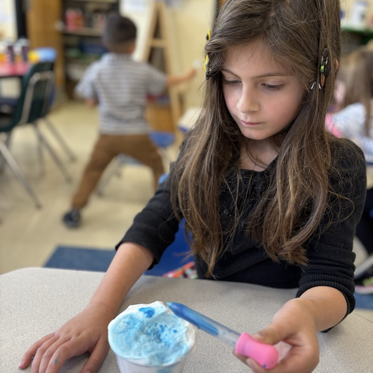 student using a dropper