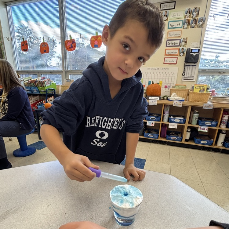 student using a dropper