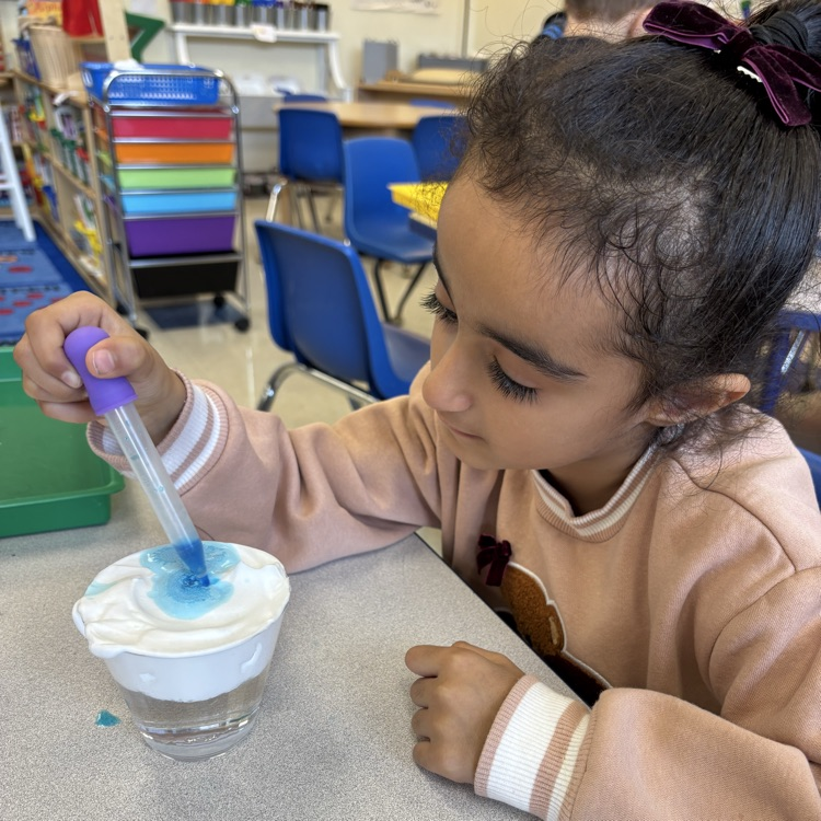 student using a dropper