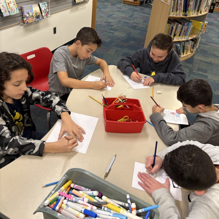 students coloring veterans cards