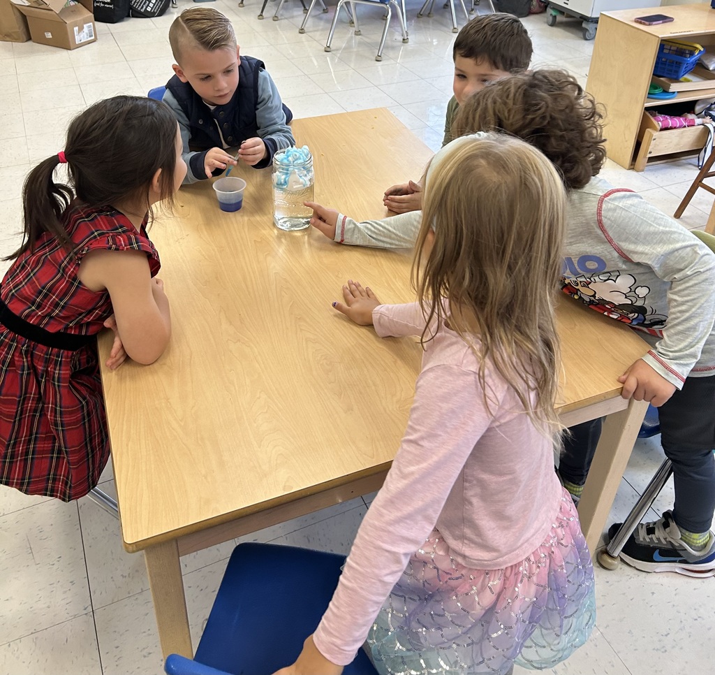 child with science experiment