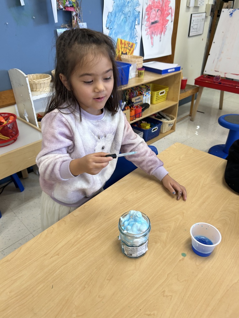 child with science experiment