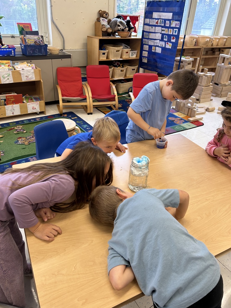 child with science experiment