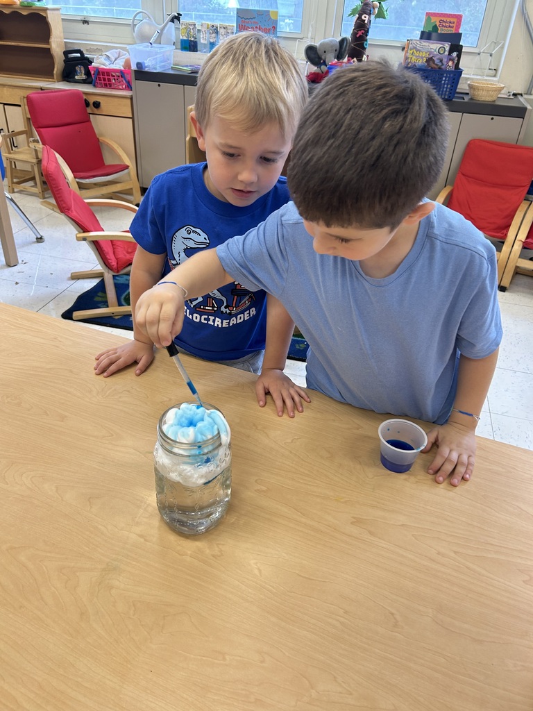 child with science experiment
