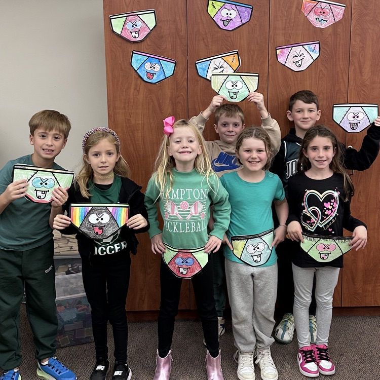 students holding up their “creepy underwear"