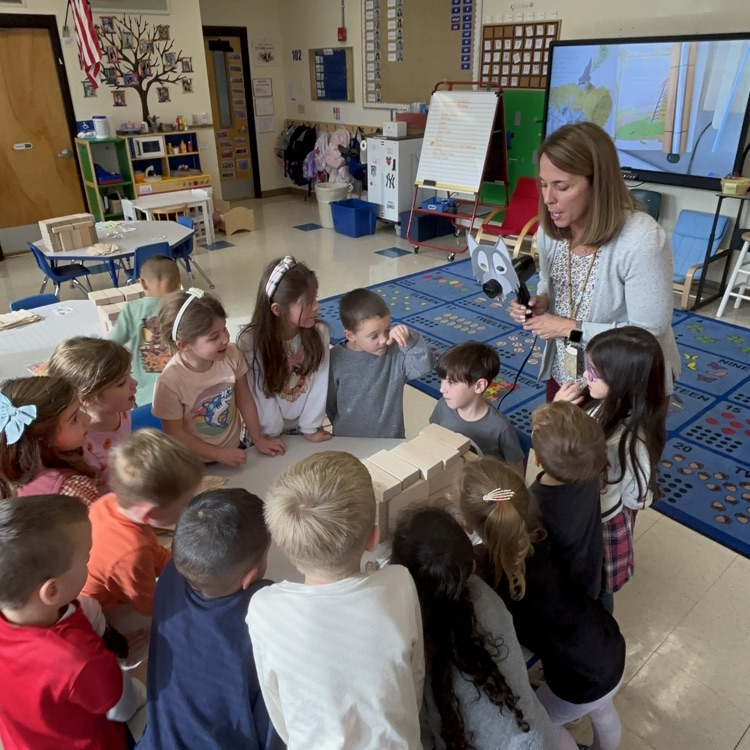 children retelling with three little pigs
