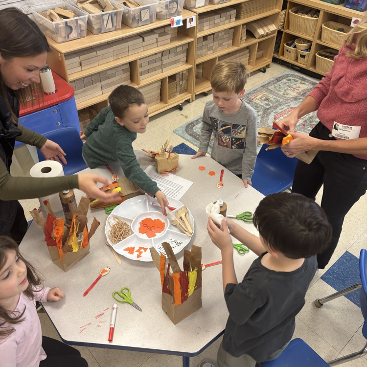 Children working on Thanksgiving crafts
