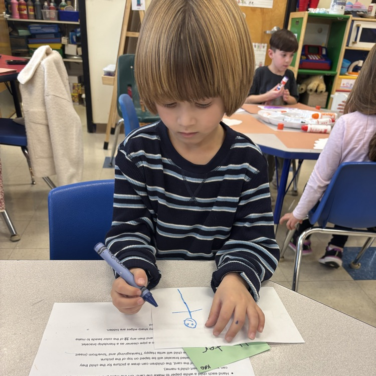 Children working on Thanksgiving crafts