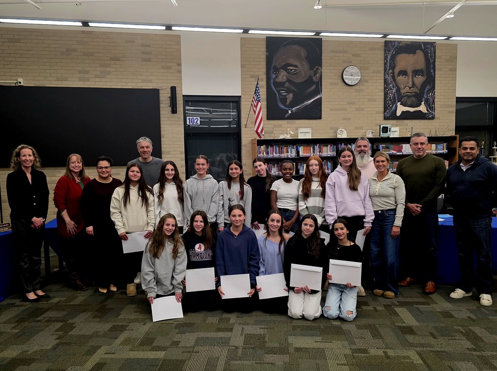 school board with girls soccer team