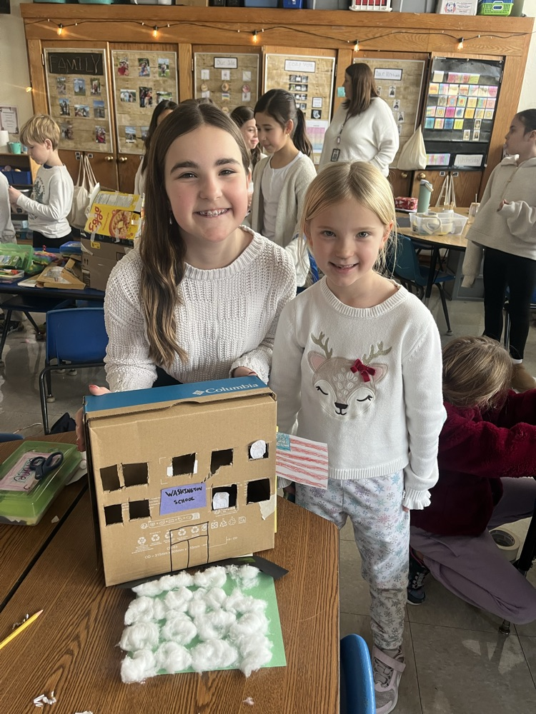 2 children with a model the created of Washington