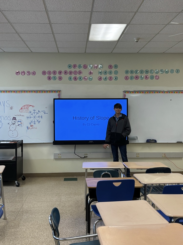 student presenting powerpoint 