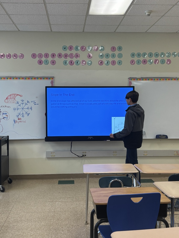 student presenting powerpoint 
