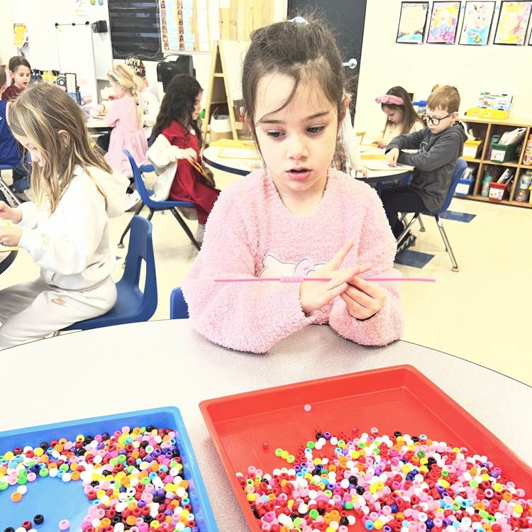 KRO found ways to make 10 by making beaded bracelets to help them count.