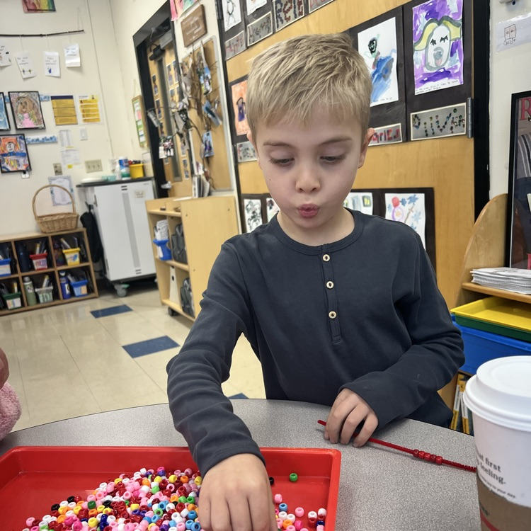 KRO found ways to make 10 by making beaded bracelets to help them count.
