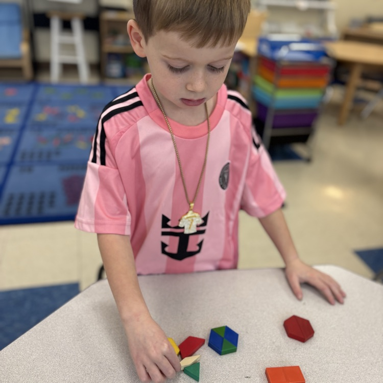 boy playing with shapes