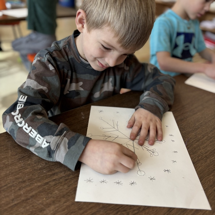 boy, drawing snowflake