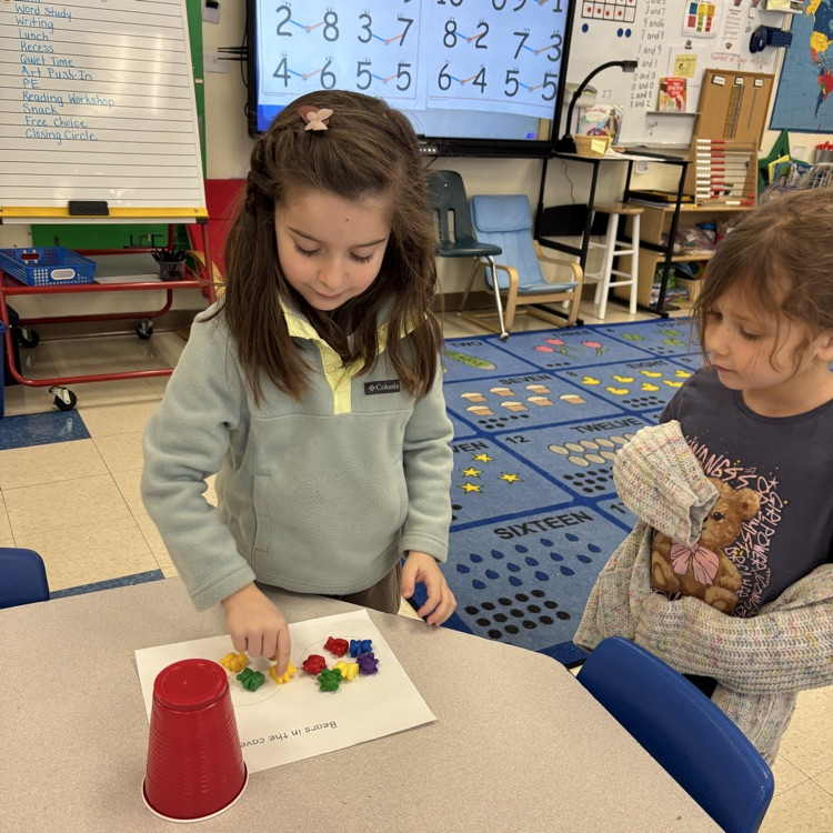The girls playing a math game
