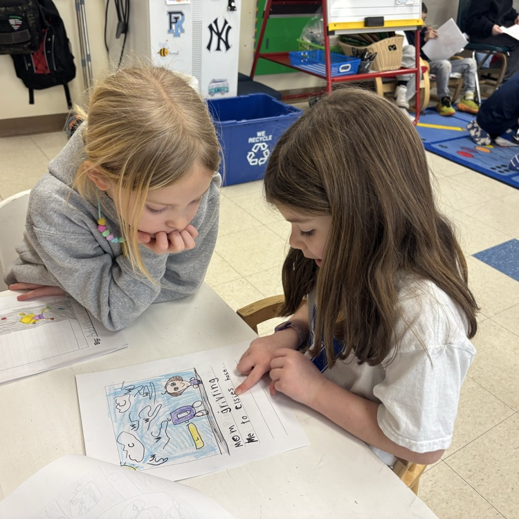 girls reading to one