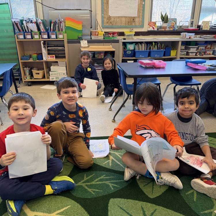 children reading to each other 