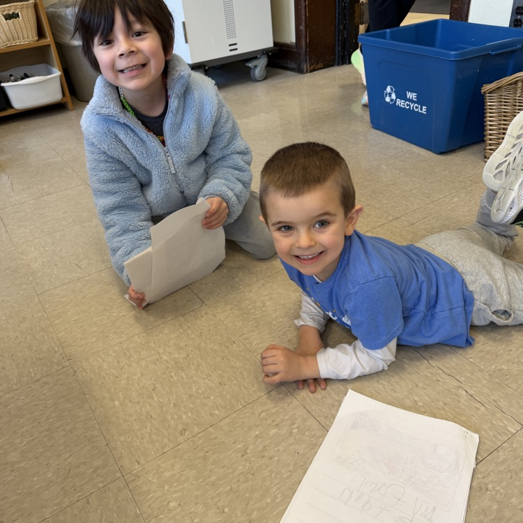 children reading to each other 