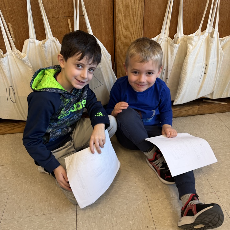 children reading to each other 