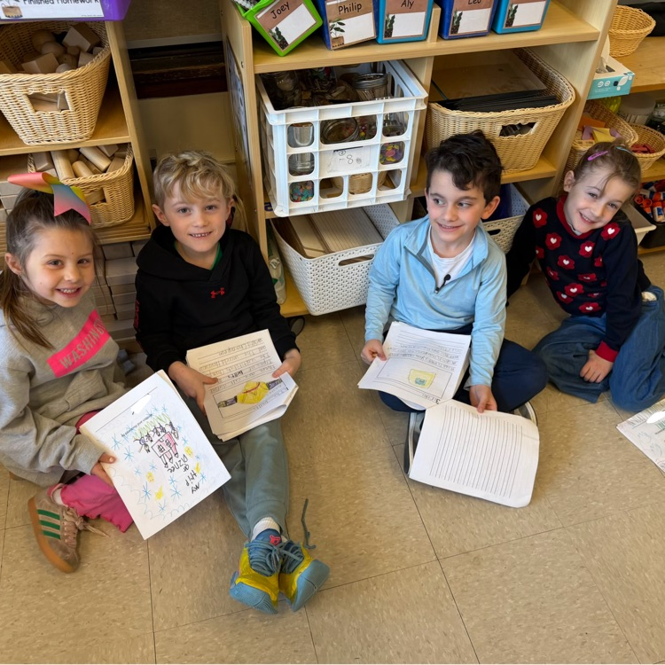 children reading to each other 