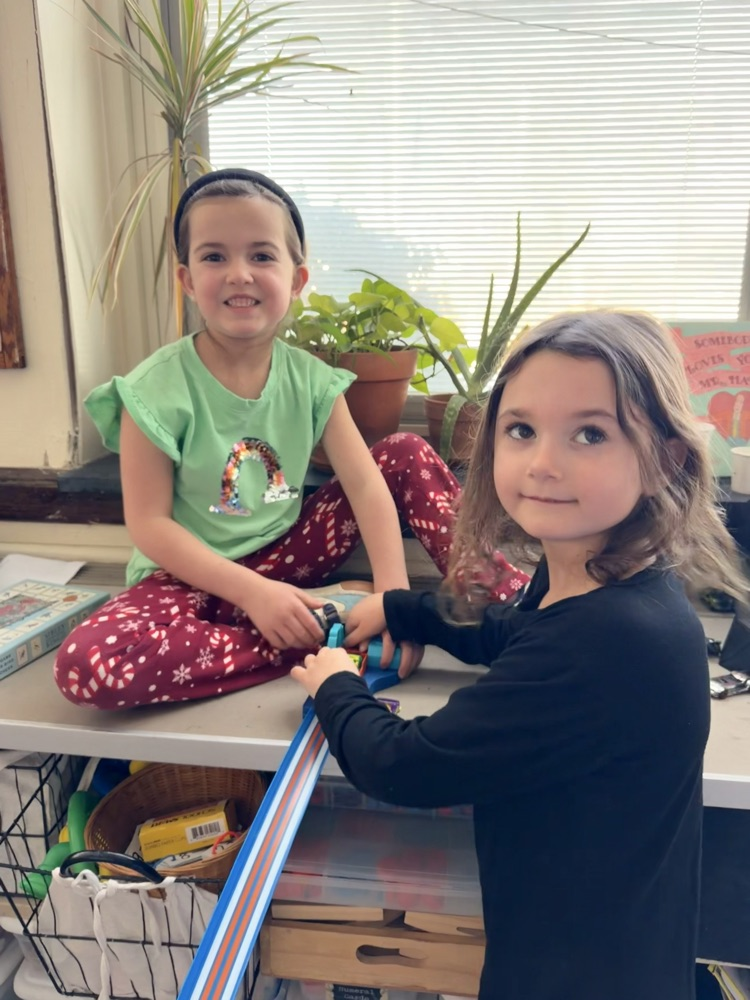 two students playing together