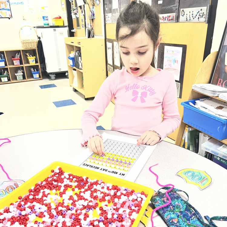 KRO counts by 10 to bead 100 Day necklaces