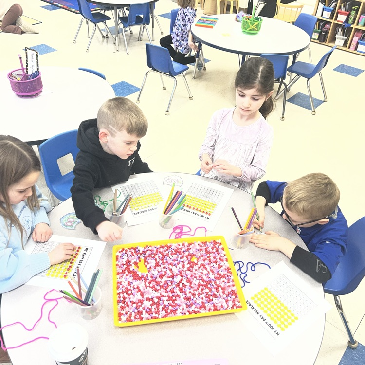 KRO counts by 10 to bead 100 Day necklaces