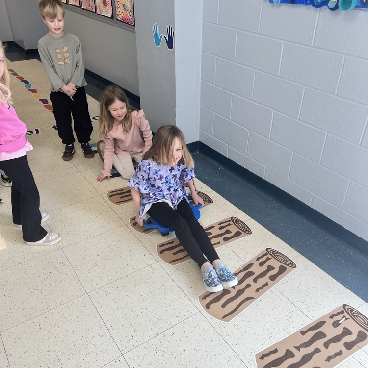 KRO learns about force & motion by pushing a scooter